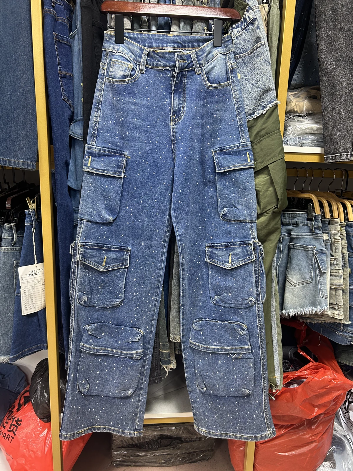 Blue cargo jeans with multiple flap pockets